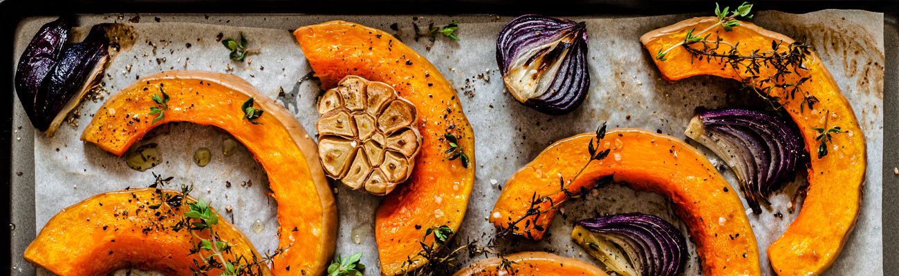 Roasted Butternut Squash Slices with Red Onions and Thyme, close up
